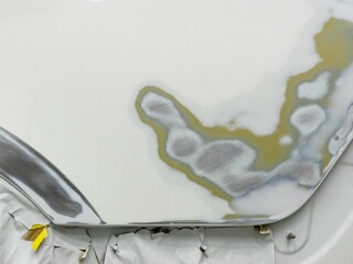 cleaned car repair part for further application of putty and primer. technological stage in car painting.