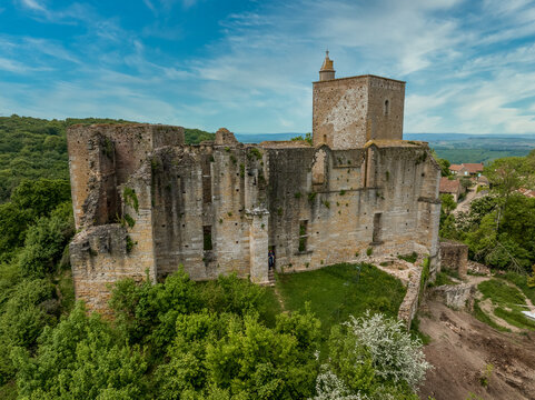 Aerial view of Brancion a hidden gem authentic medieval village in the heart of Southern Burgundy France with town gate, ruined Gothic medieval castle, living example of medieval military architecture