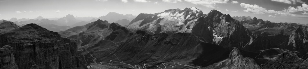Panoramic grayscale view of the Marmolada Dolomite mountains in Italy