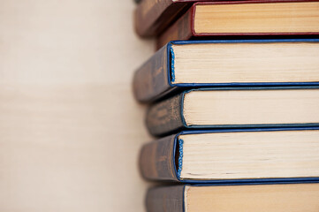 A stack of books is on the table, top view. copy space