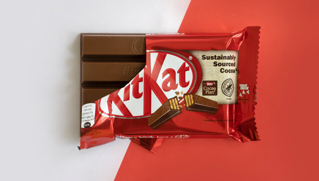 May 3, 2022 Ukraine city Kyiv chocolate Kit Kat on a colored background