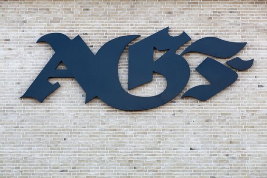 Aarhus, Denmark - March 13, 2022: Aarhus AGF logo on a wall. Aarhus AGF is a professional Danish football club playing currently in superliga