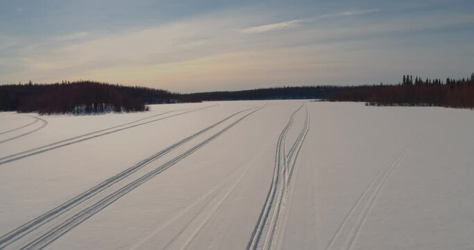 Snowmobile tracks in the snow in the Kenai National Wildlife Refuge, Alaska