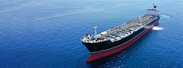 Aerial drone ultra wide photo of latest technology in safety standards crude oil tanker cruising Aegean deep blue sea, Greece