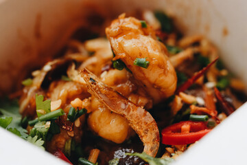 cooking udon noodles with various additives to take away