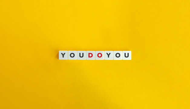 You Do You Slang Phrase on Letter Tiles on Yellow Background. Minimal Aesthetics.