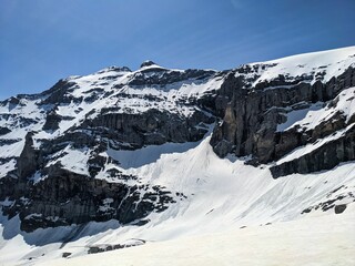 Ski tour below mount clairden. High-altitude ski tour in the Swiss mountains. High quality photo. Panorama picture
