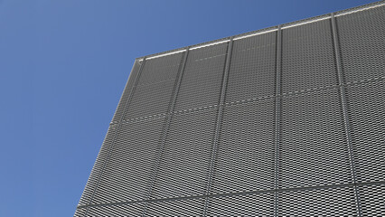 Metal construction wall cladding
