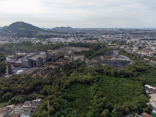 Slum favela-style community city on the outskirts of Vitoria, Cariacica, Espirito Santo - aerial drone view