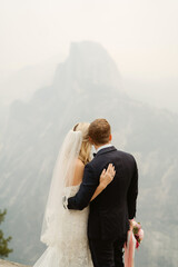 Wedding couple at Glacier Point California, mountains and elopement
