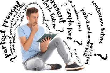Thoughtful guy studying English tenses on white background