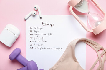 Paper with training plan, earphones, sport top, dumbbells and hourglass on pink background
