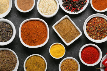 Set of different aromatic spices on dark background