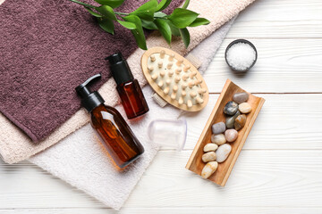 Set of bath supplies with vacuum jar for anti-cellulite massage on white wooden background