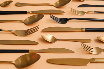 Many different cutlery on color background