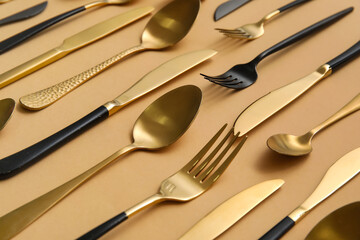 Many different cutlery on color background