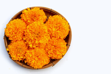 Marigold flowers in bamboo basket