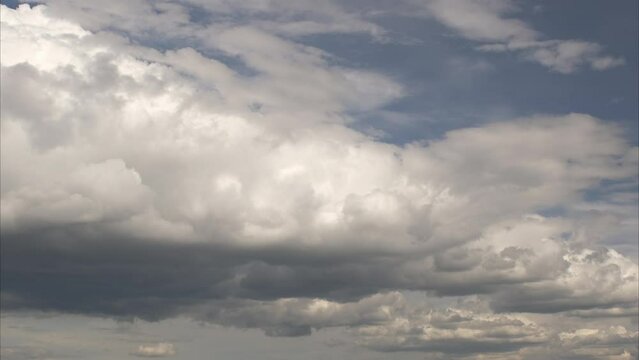 Blue sky white clouds. Cloud time lapse nature background. clean, no birds.
