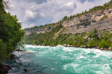 Rapids in the Niagara River near the so called whirlpool at the nagar falls. The river winds...