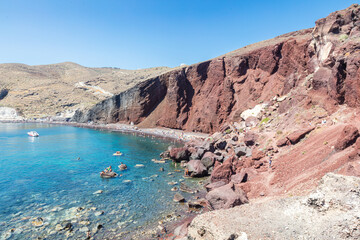 Fototapeta na wymiar Red Beach is located near the old village of Akrotiri and it is one of the most famous and beautiful beaches of Santorini, Greece. Ideal for diving, Santorini is located in the Cyclades archipelago