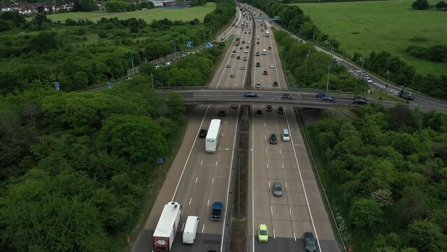 Aerial view for busy motorway , birdseye view busy cars and roads,traffic , junction 10 , m25