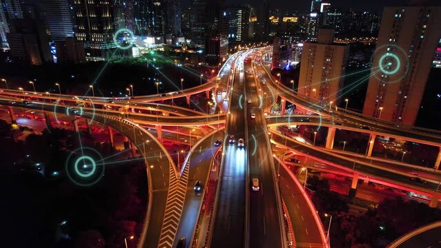 Aerial View Of Smart City And Smart Traffic On Road Intersection In Hangzhou At Night