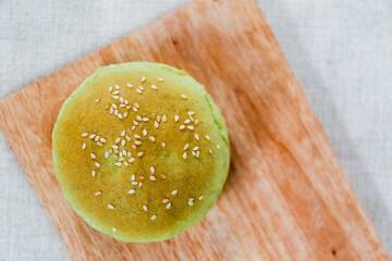 Green Pandan burger buns with sesame set with copy space for text	

