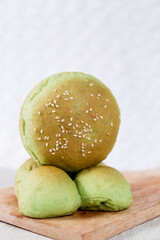 Green Pandan burger buns with sesame set with copy space for text	
