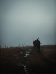 Obraz na płótnie Canvas hunters in the fog