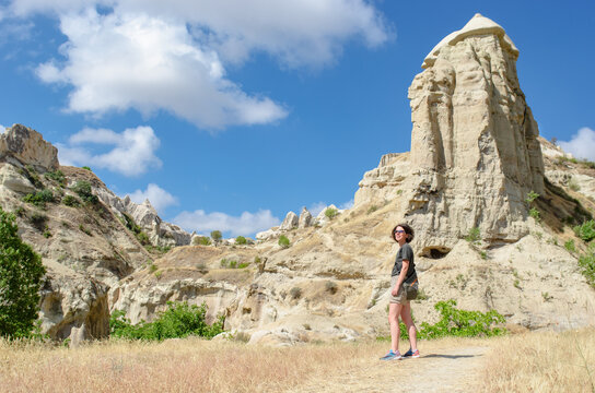 Travel vacation in Cappadocia, woman tourist hiking in valley in Cappadocia, Turkey