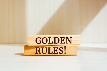 Wooden blocks with words 'Golden Rules'.