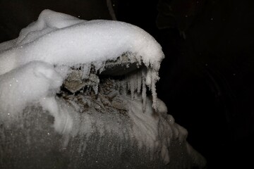 ice cave in svalbard / spitzbergen with snow and ice