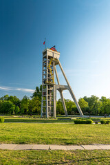 Mine shaft tower "Prezydent" in former coal mine "Königsgrube” ("Król") in Chorzów, Silesia, Poland. Tall, concrete, industrial construction build in 1933.