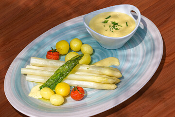 white asparagus spears with boiled potatoes, grilled cherry tomatoes and bernaise sauce