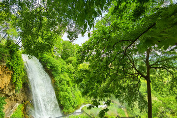 edessa waterfalls in spring season among green trees in greece