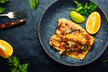 Roasted fish fillets.