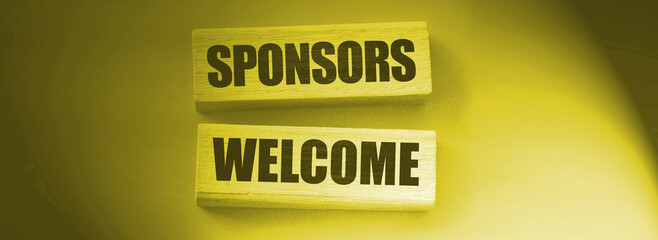 SPONSORS WELCOME on wooden blocks. Sponsorship donation business concept.