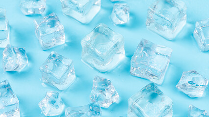 Ice Cubes and Water Drops on Blue Background.