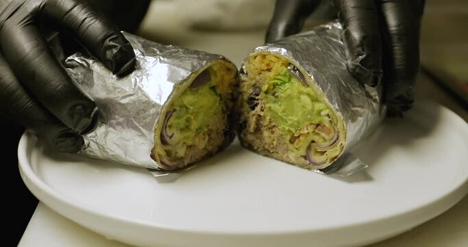 Burrito cut in half. Mexican fod.