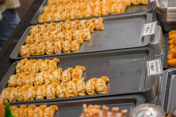 Chicken and veg gyozas on display at Brick Lane food market in London