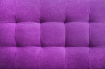Purple suede leather background for the wall in the room. Interior design, headboards made of...