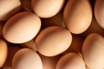 Raw chicken eggs organic food for good health - image. Lots of fresh chicken eggs close up.