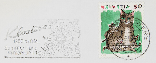 briefmarke stamp vintage retro alt old katze cat kitten kätzchen helvetia schweiz swiss klosters slogan werbung sommer winter kurort blume flower papier paper