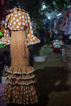 typical spanish dress with polka dots on a mannequin