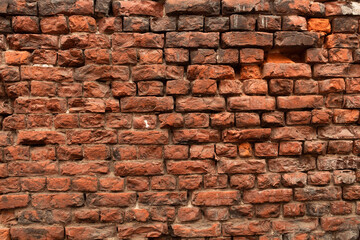 Wall of a red brick house over 100 years old