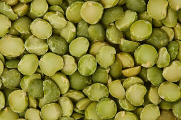 Macro image of grinding green peas natural food background. Top view backdrop.