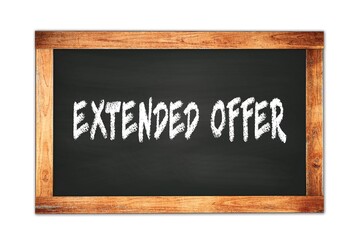 EXTENDED  OFFER text written on wooden frame school blackboard.