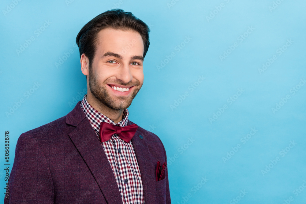 Sticker Portrait of cheerful handsome well dressed man in suit prepare to go on date romantic boyfriend isolated on blue color background