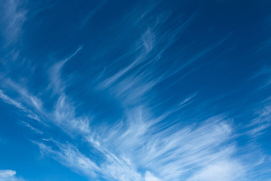 Beautiful blue sky with unusual white clouds.