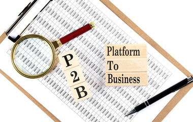 P2B - Platform to Business text on wooden block on chart background